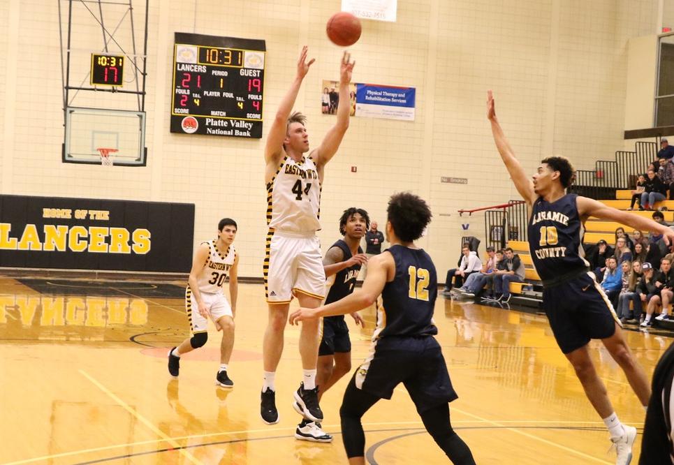 Men's basketball eases by Eagles